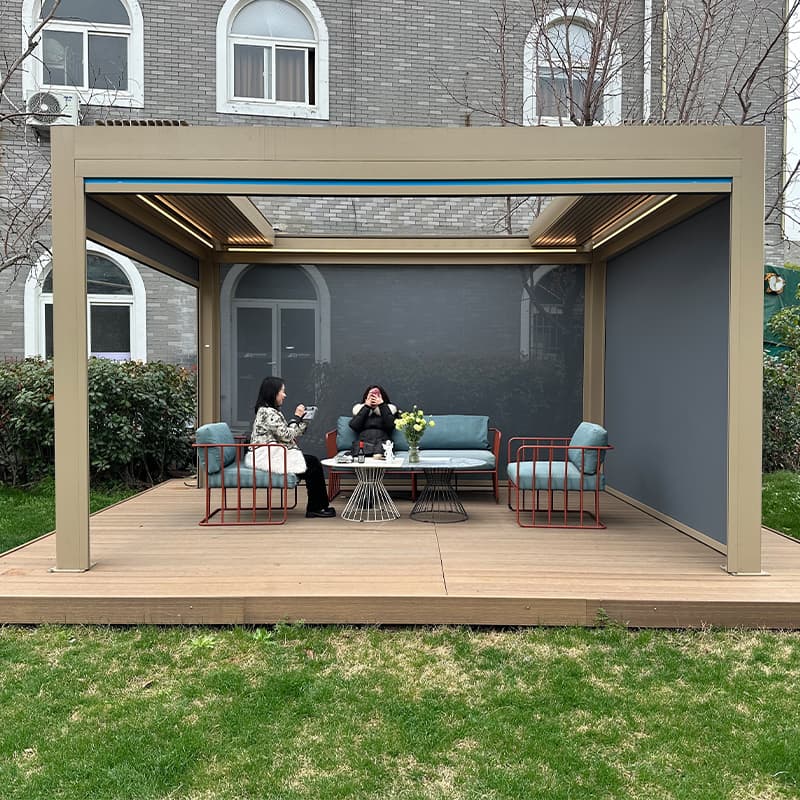 Retractable aluminum pergola with side screens for a garden seating area